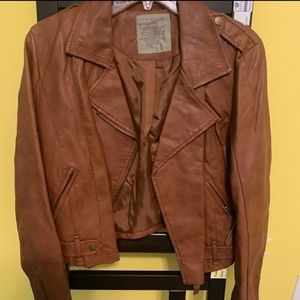 Faux leather jacket - tears along collar